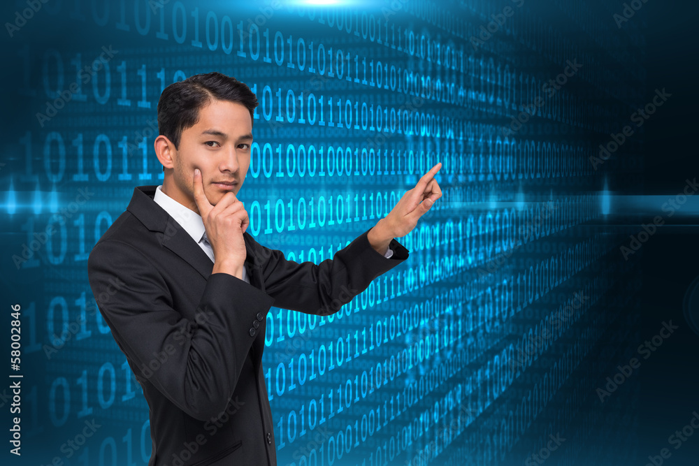 Composite image of thoughtful asian businessman pointing Composite image of thoughtful asian businessman pointing