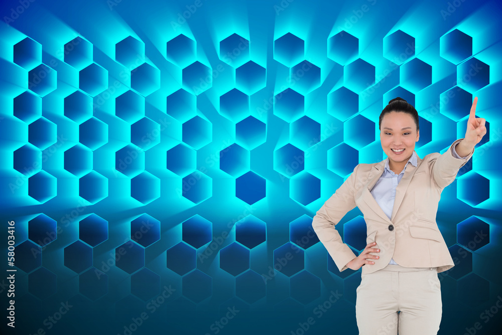 Composite image of smiling asian businesswoman pointing Composite image of smiling asian businesswoman pointing