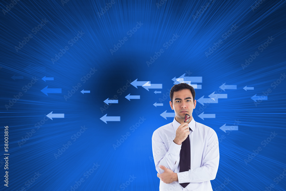 Composite image of unsmiling businessman holding glasses Composite image of unsmiling businessman holding glasses