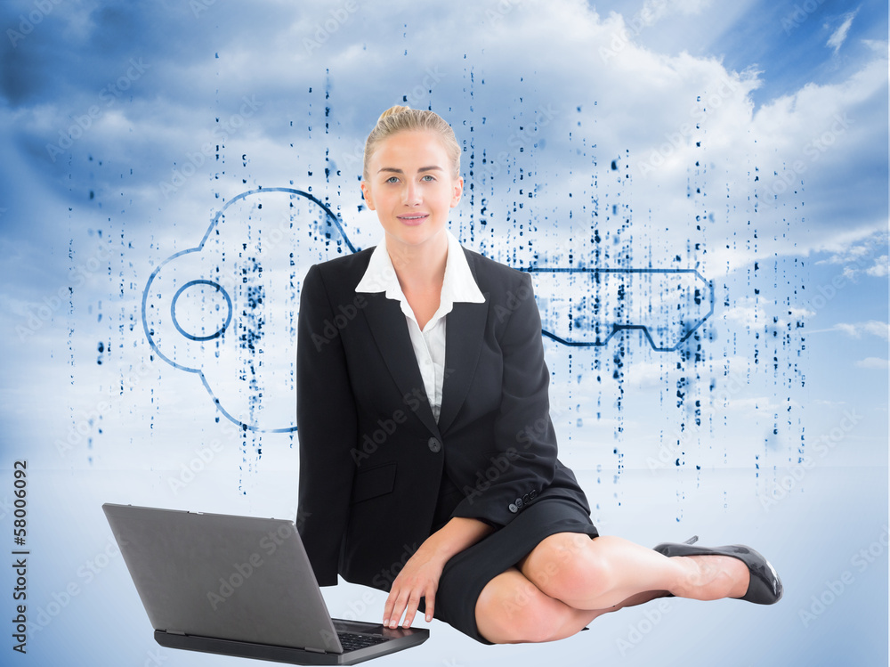 Composite image of businesswoman using laptop Composite image of businesswoman using laptop