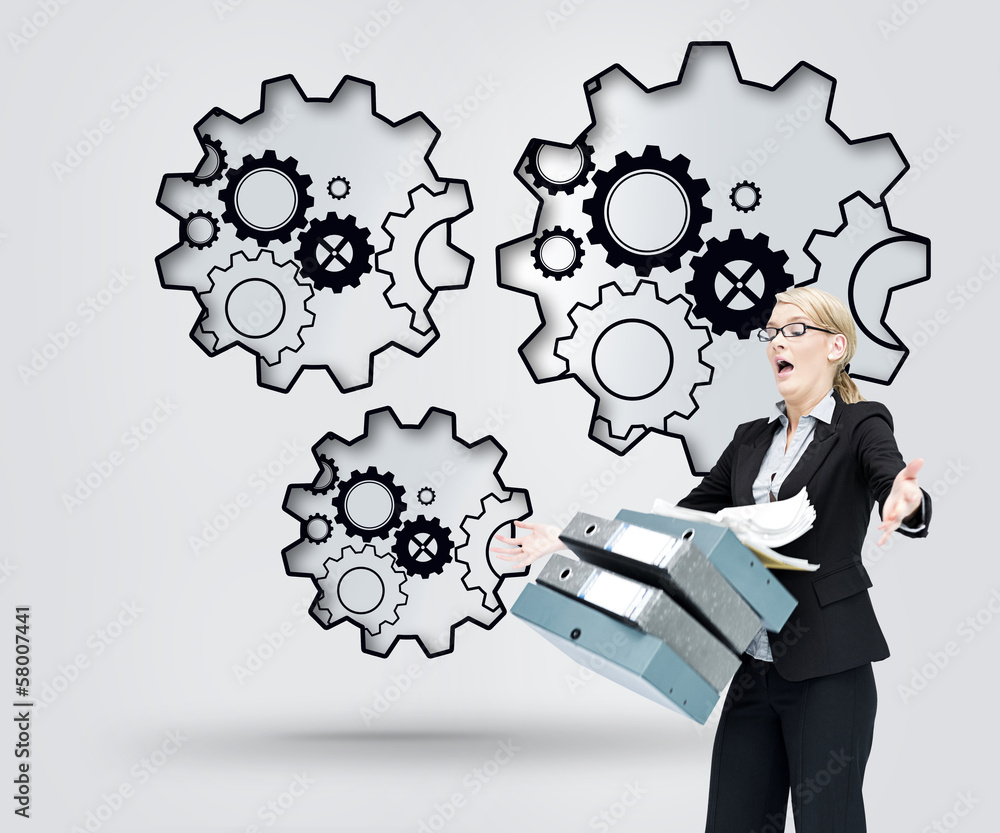 Composite image of businesswoman dropping many folders Composite image of businesswoman dropping many folders