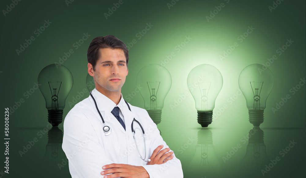 Composite image of serious doctor with arms crossed Composite image of serious doctor with arms crossed
