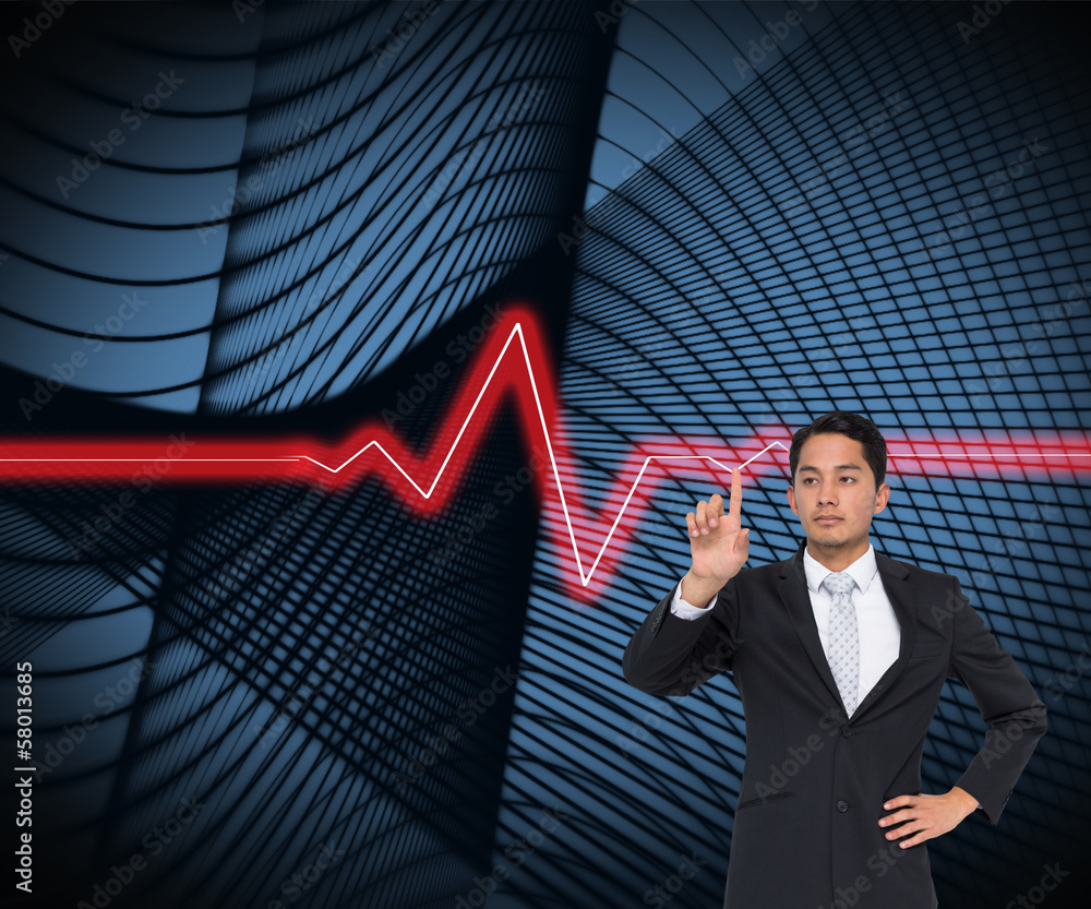 Composite image of unsmiling asian businessman pointing Composite image of unsmiling asian businessman pointing