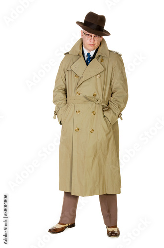 Vintage forties man in trenchcoat & trilby, isolated on white photo