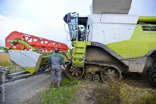 Lavori in Risaia - Aggancio Barra Falciante