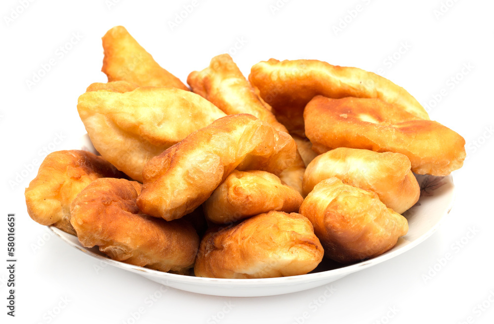 Russian patties in the plate on white background Russian patties in the plate on white background