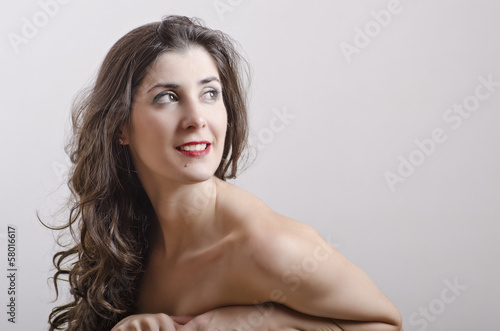 Woman portrait with naked shoulders.