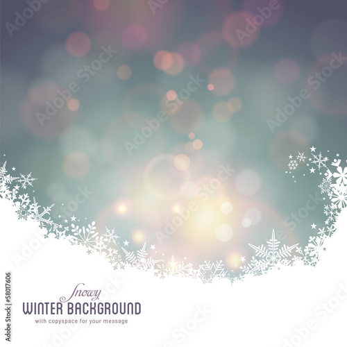 snowy winter background with defocused lights