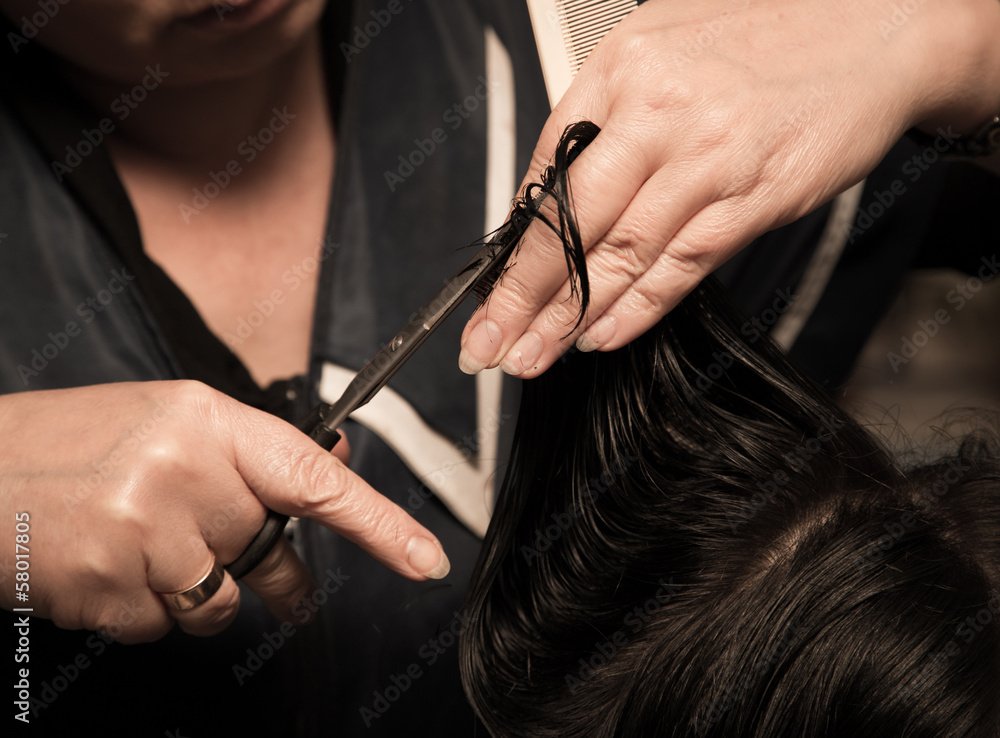 Wunschmotiv: Women's haircut at the barber scissors #58017805