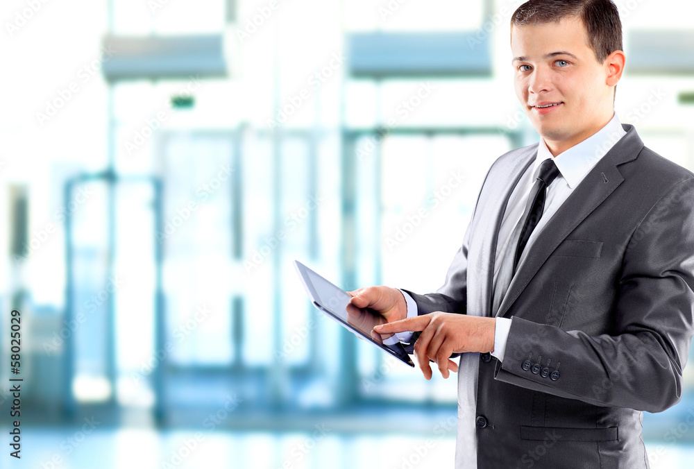 Fototapeta premium Businessman using a tablet computer