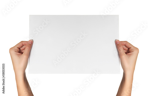 female hands hold white paper