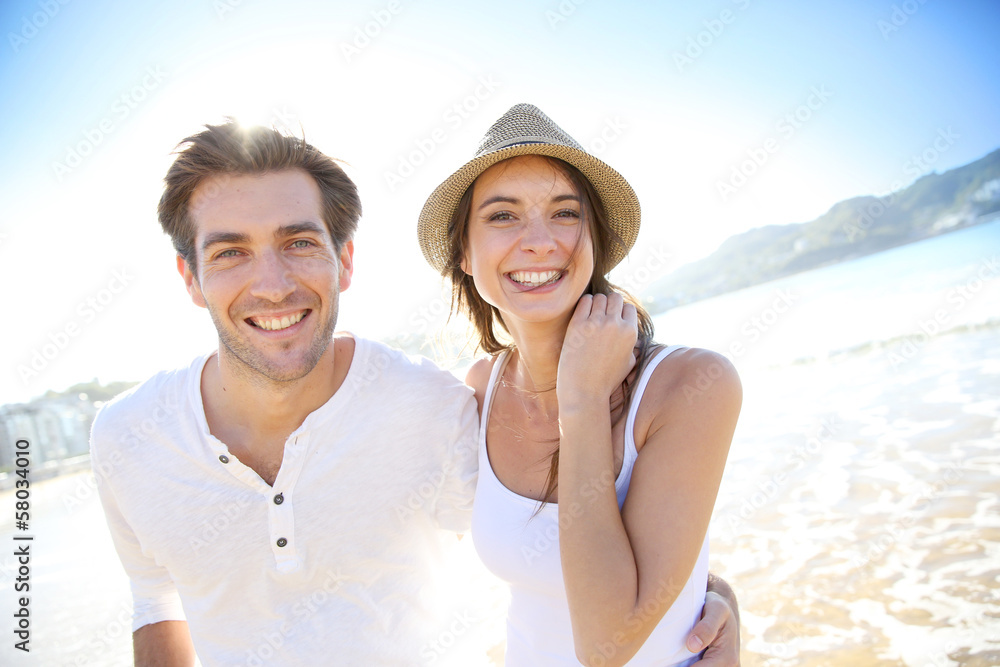 Couple having fun at the beach Couple having fun at the beach