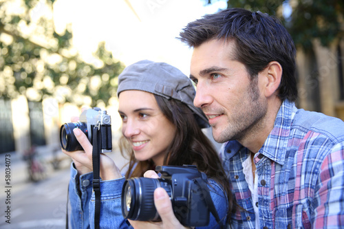 Photographers shooting in city scenary