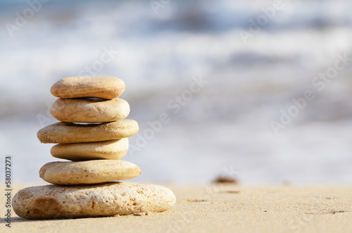 Stack of pebbles at the sea coast