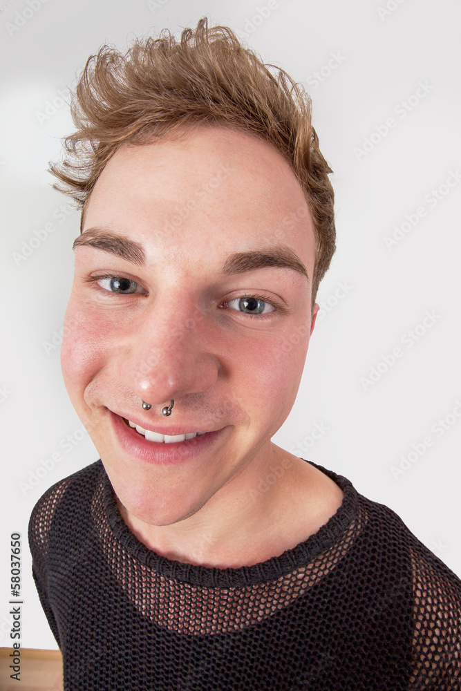 Wide angle portrait of a spoiled young man Wide angle portrait of a spoiled young man