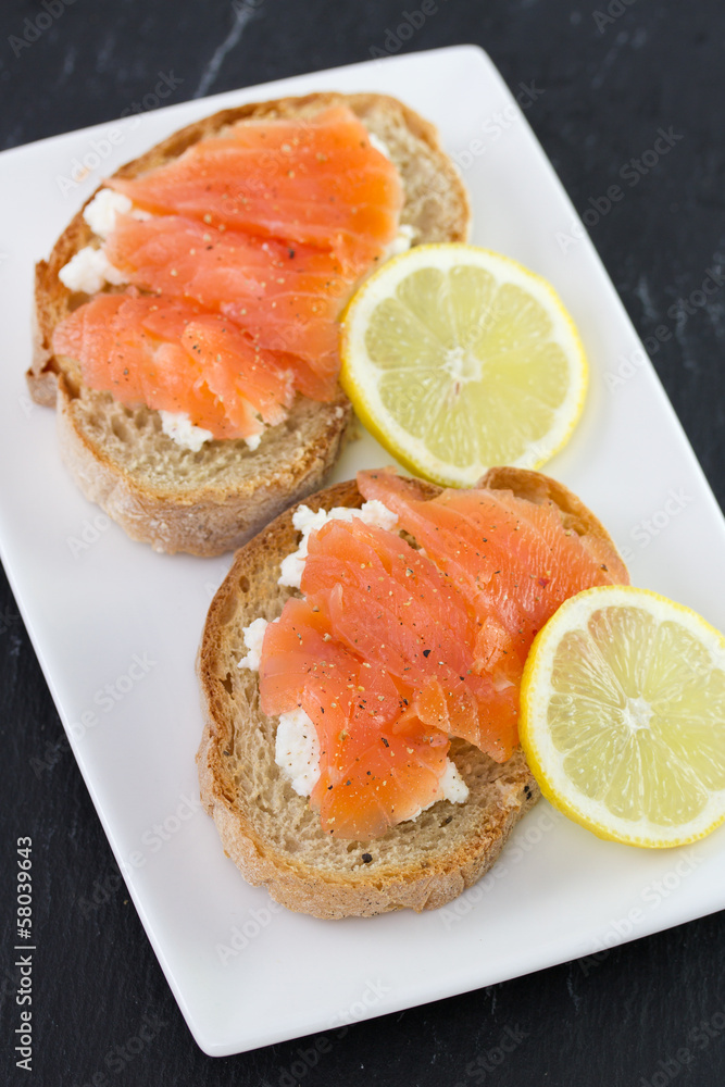 sandwich with salted salmon and lemon sandwich with salted salmon and lemon