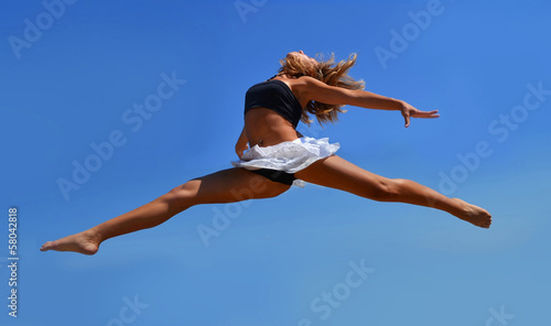 Dancing girl in a high jump