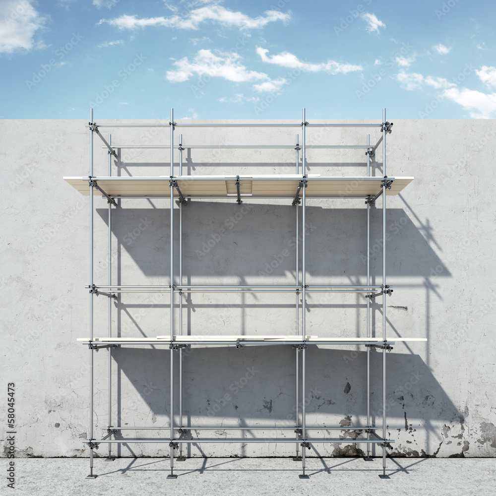 scaffold on wall in front of sky scaffold on wall in front of sky