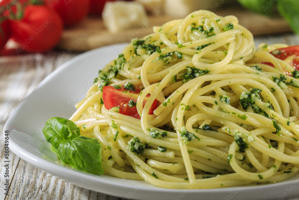 spaghetti with pesto and cherry tomatoes