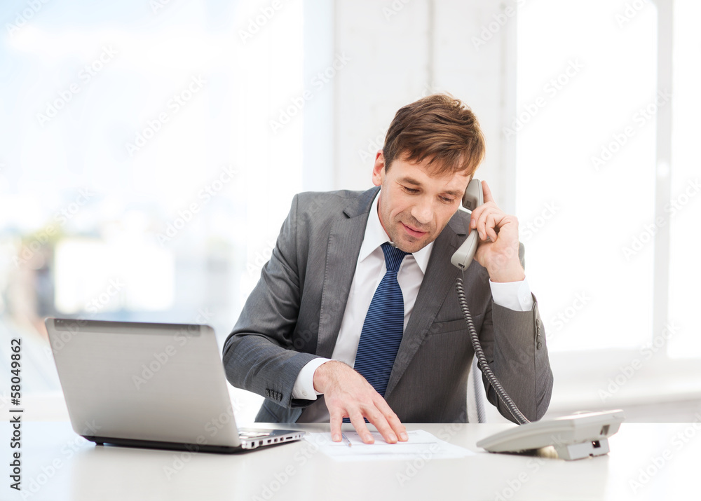 businessman with laptop computer and phone businessman with laptop computer and phone