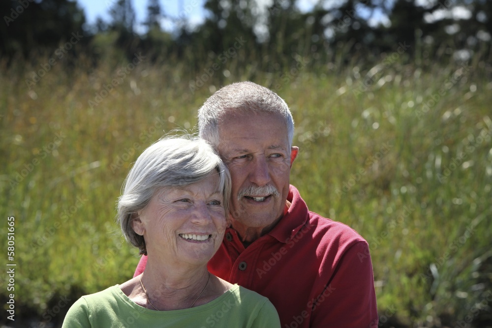 Happy old couple outside