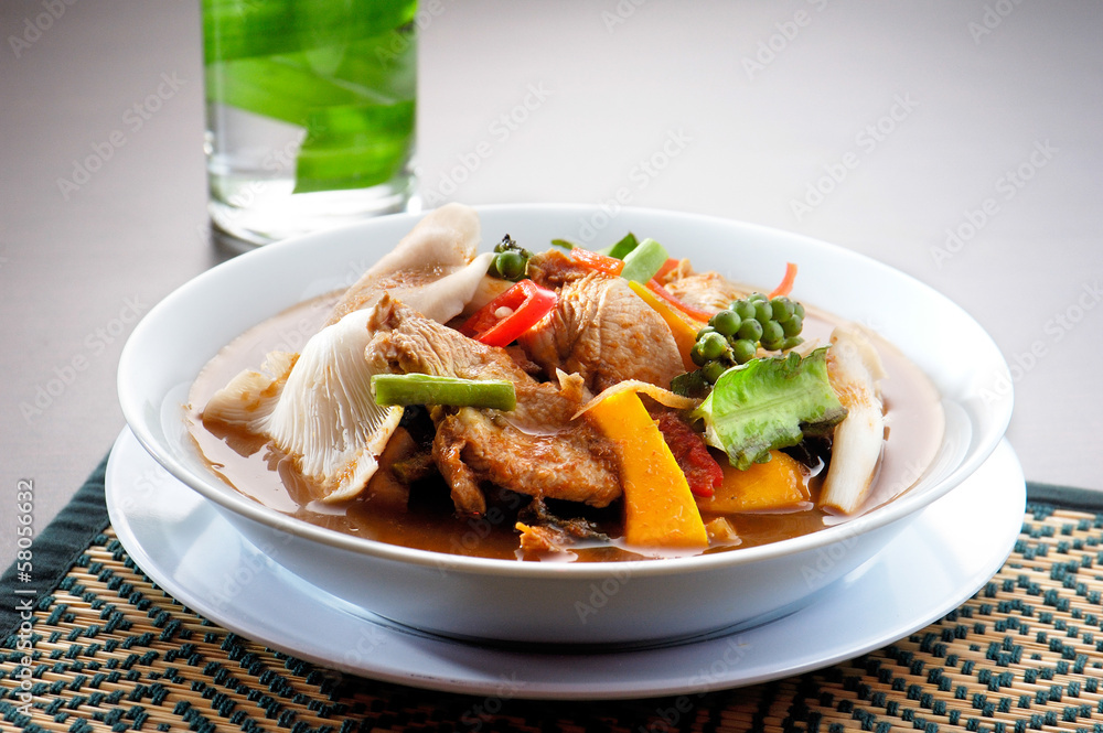 chicken wing tom yum bowl (Thai food) on background