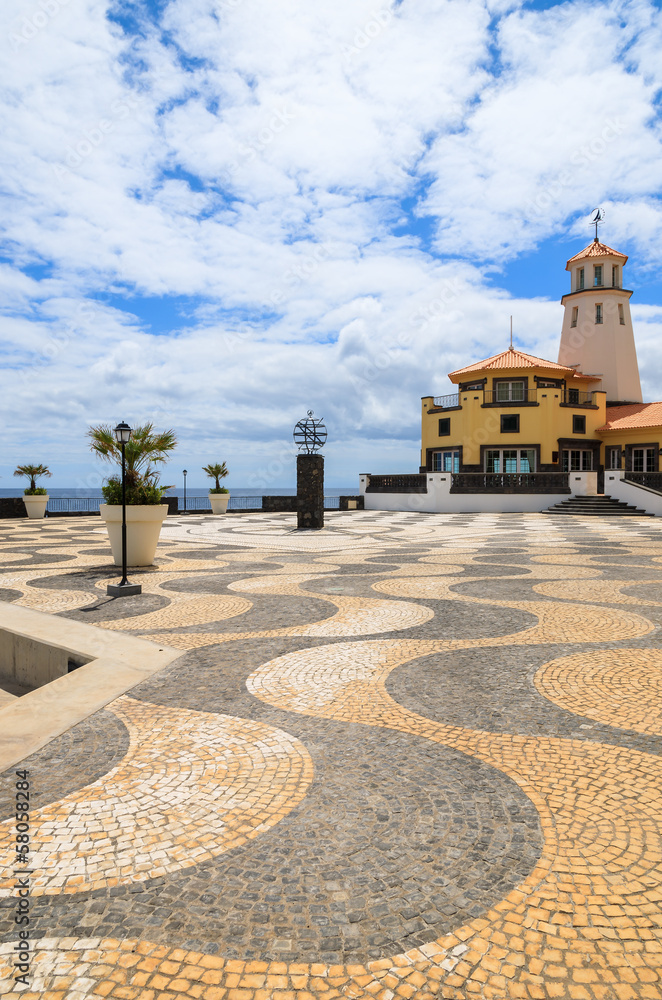 Lighthouse building on coast of Madeira island, Portugal