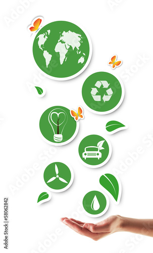 Hand holding green ecological icons