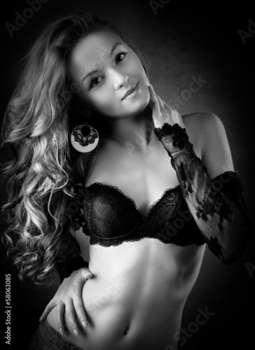 Canvas Print sensual blond woman in lingerie,  dark background
