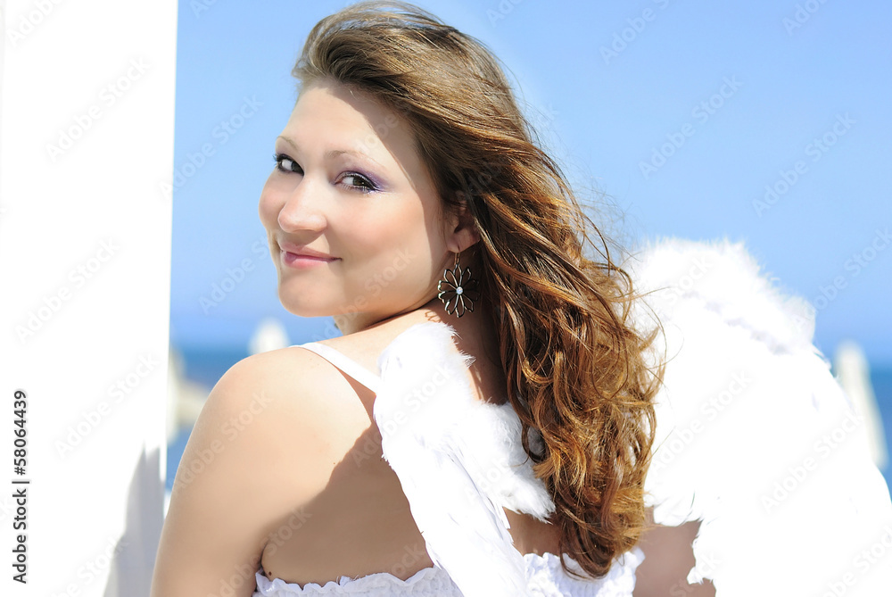 beautiful pregnant with a girl with wings