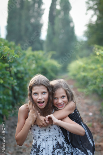 beautiful girls in fall vineyard