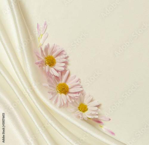 White fabric with folds and...