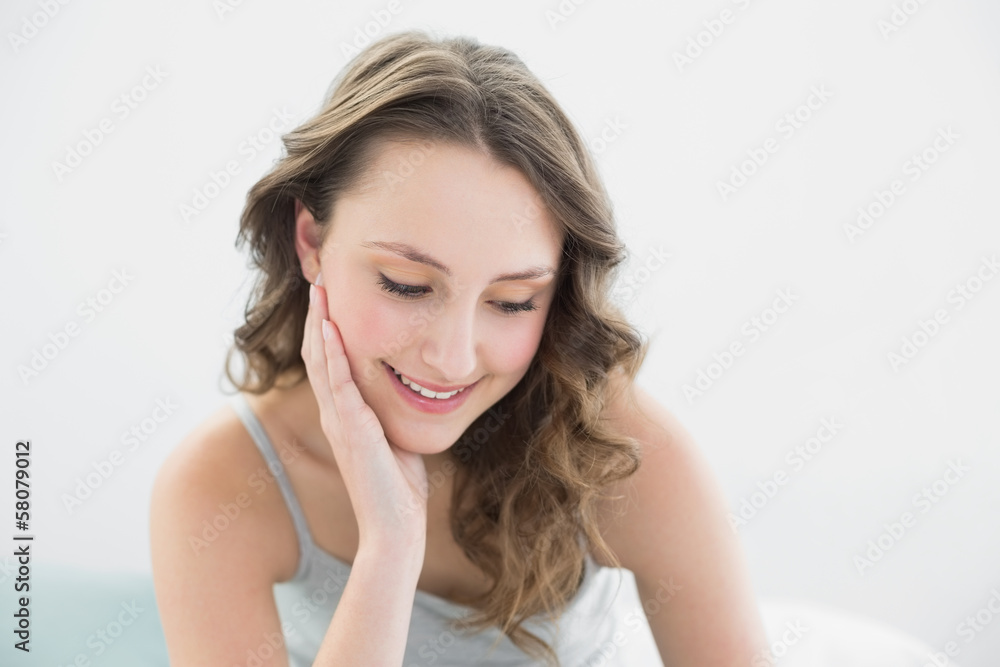 Close up of smiling thoughtful pretty woman Close up of smiling thoughtful pretty woman