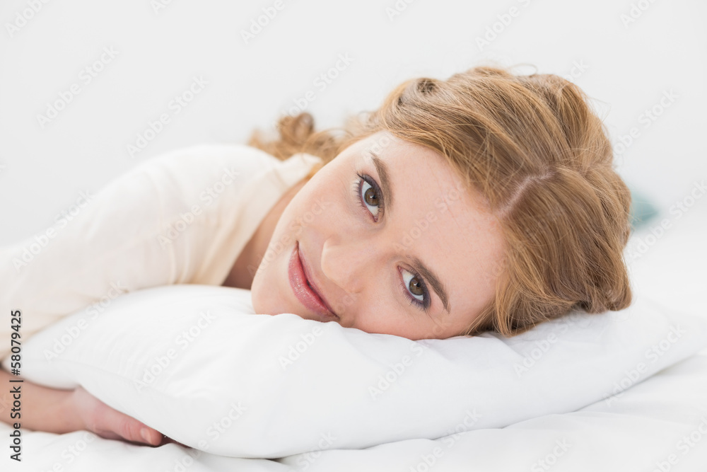 Close up of a pretty young woman in bed Close up of a pretty young woman in bed