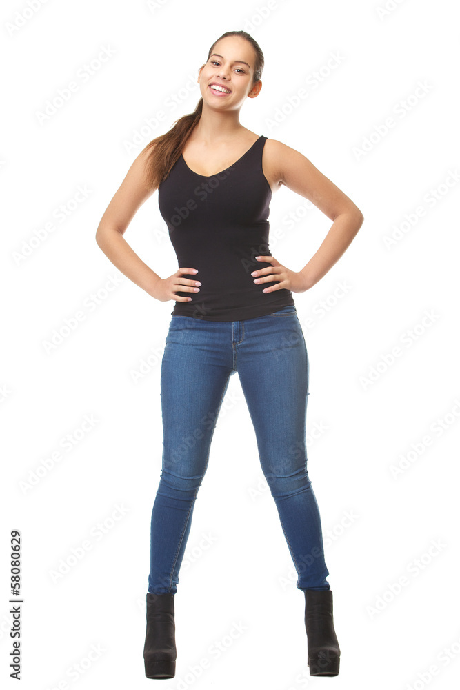 Portrait of a young woman smiling in blue jeans Portrait of a young woman smiling in blue jeans