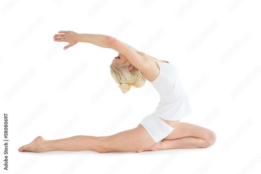 Toned young woman stretching hands backwards Toned young woman stretching hands backwards