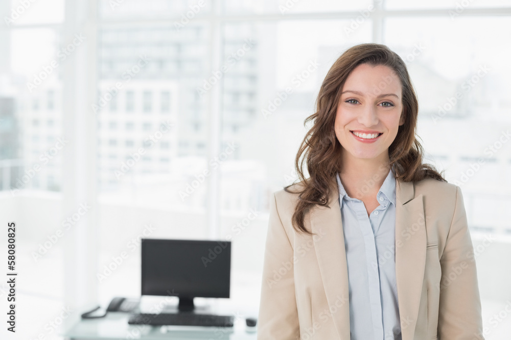 Portrait of an elegant smiling businesswoman in office Portrait of an elegant smiling businesswoman in office