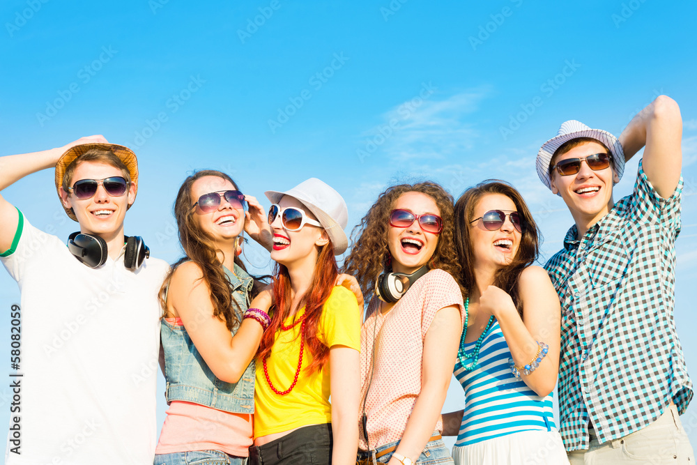group of young people wearing sunglasses and hat group of young people wearing sunglasses and hat