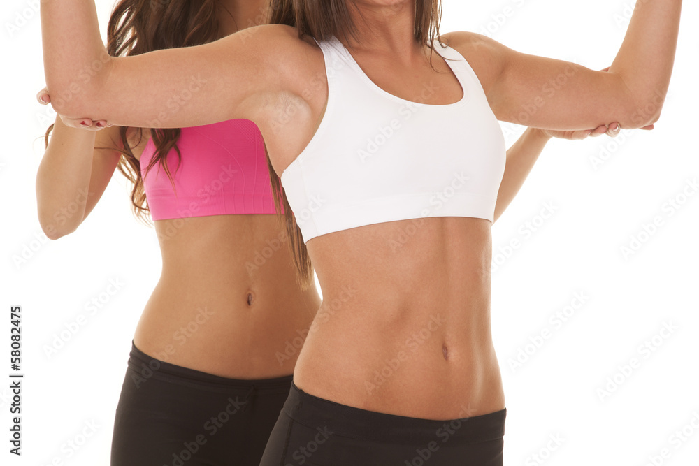 Two women fitness bodies train Two women fitness bodies train