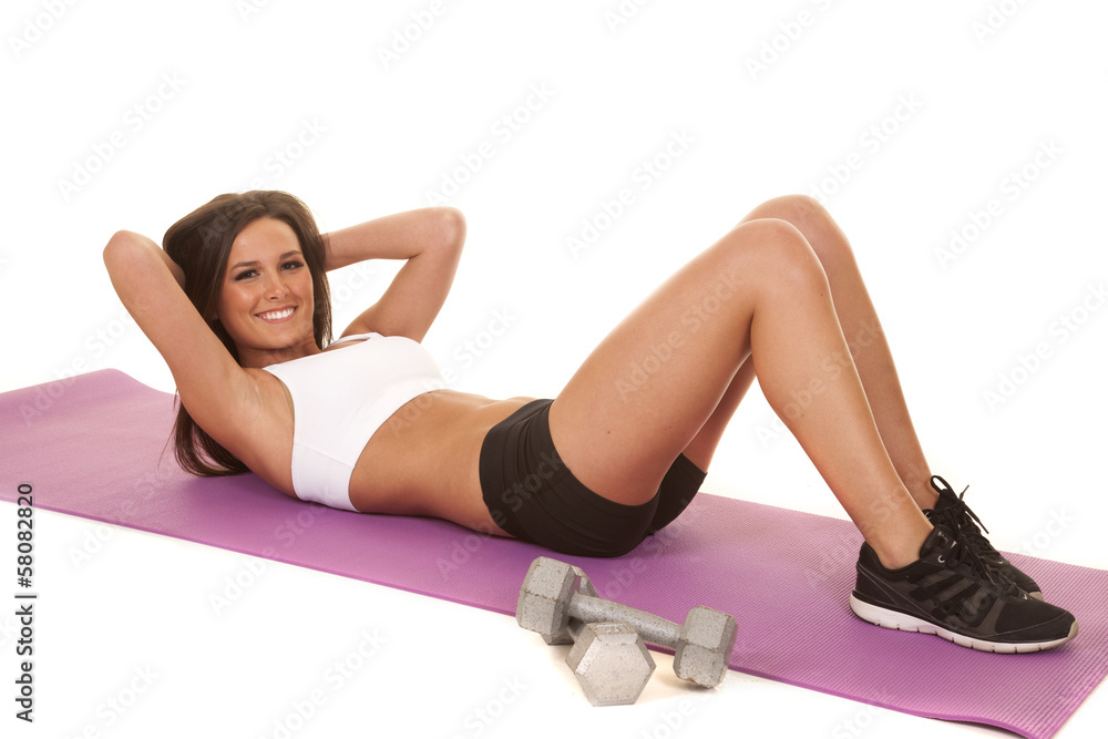 Obraz premium Woman white top fitness crunch smile