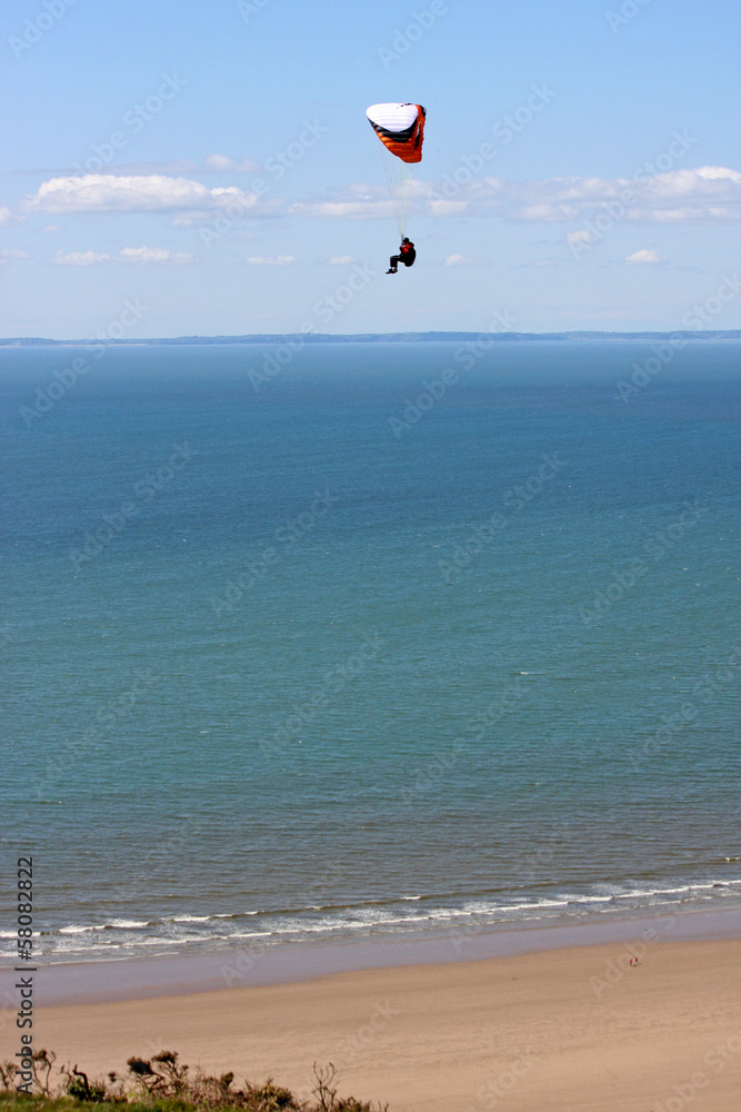 Paraglider above Rhossili beach