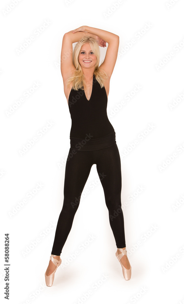 Fototapeta premium Beautiful ballerina posing en pointe