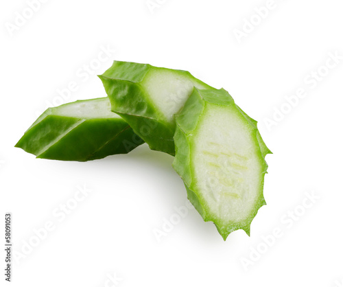 green zucchini on a white background