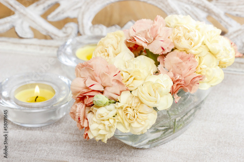 Floral composition made of fresh pastel carnation flowers