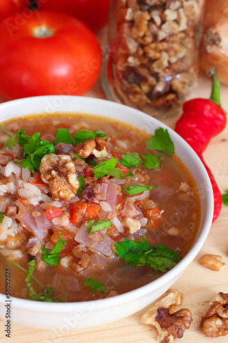 Vegan Kharcho soup with rice and walnuts