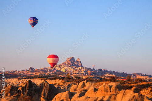 Hot air balloons rising at cappadocia in the morning