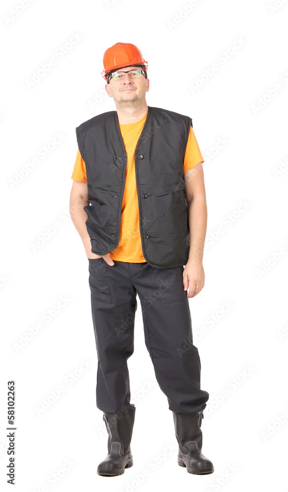 Man in workwear and hard hat Man in workwear and hard hat