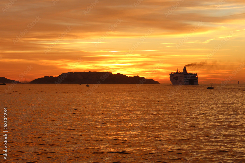 Cruise ship in port of Marseille at sunset - France  