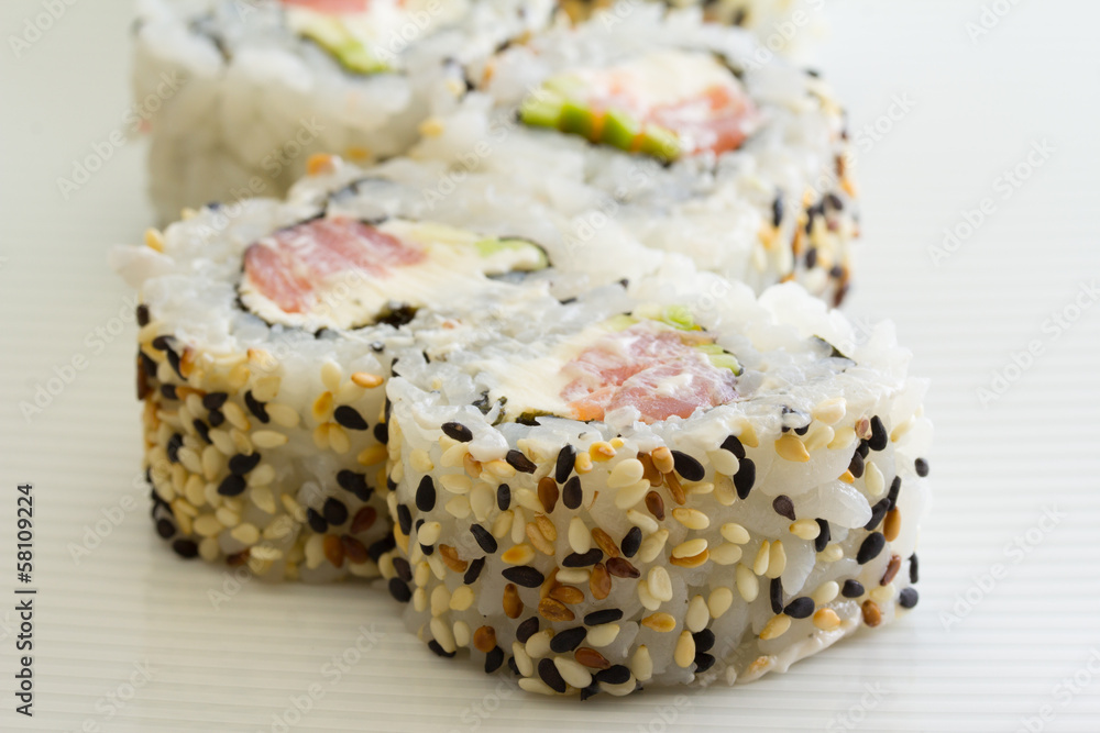Sushi roll with tuna and sesame Sushi roll with tuna and sesame