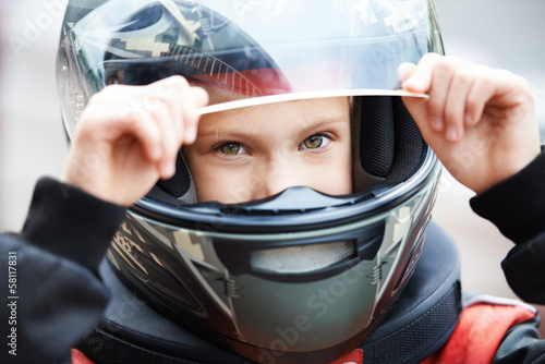 Portrait of a young racer in helmet © Sergey Ryzhov